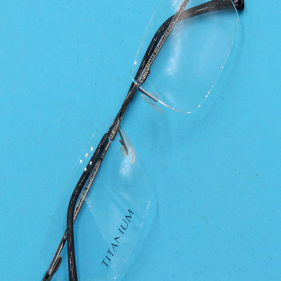 Mắt kính lão ti-tan nâu không viền 868