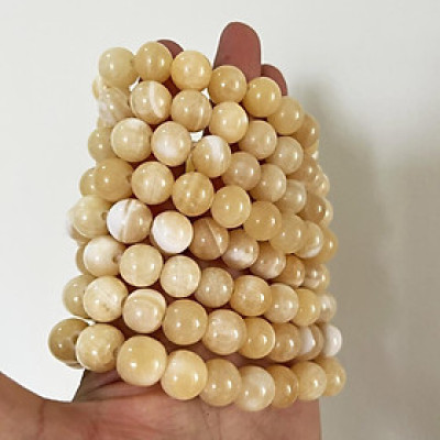 Vòng tay chuỗi hạt ngọc thật màu vàng cam cho người mệnh Thổ và hỏa đường kính hột 10 li (1cm)