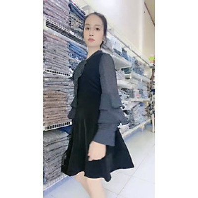 Đầm xoè tiểu thư tay dài ôm tầng kết hợp cổ nơ lịch thiệp họa tiết chấm bi nhí xinh xắn.