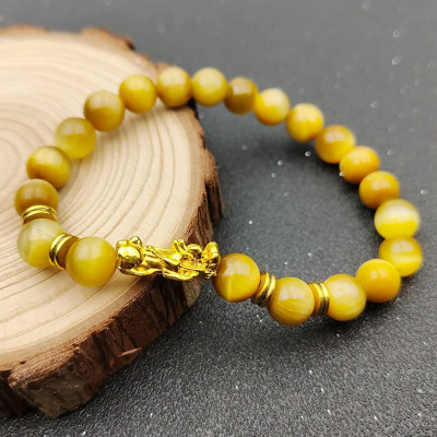 Vòng tay đá mắt hổ tâm vàng gắn tỳ hưu may mắn cho Nam và Nữ